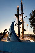 The 'hand' fountain on the west shore, beyond the city walls.